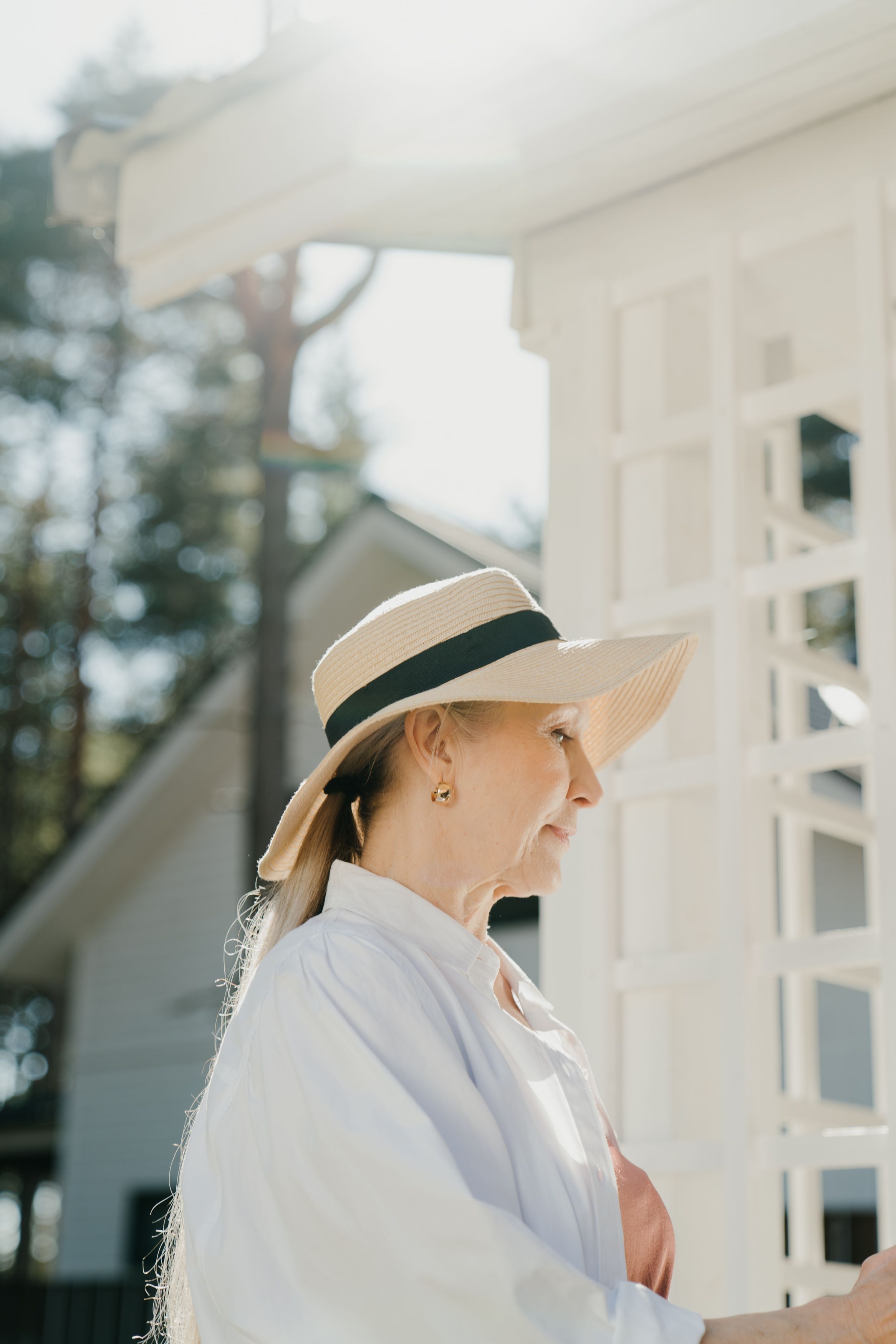 Older adult in sunlight, representing healthy longevity
